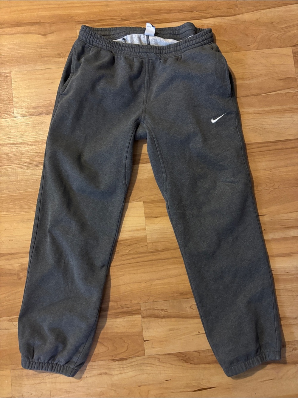 Nike Dark Gray Sweatpants with White Swoosh